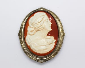 Antique Celluloid Cameo Brooch in Raised Design Frame at whisperingcityrva.com