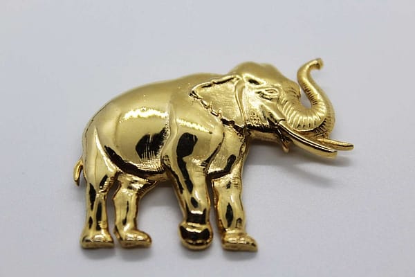 Gold Tone Elephant Brooch at whisperingcityrva.com