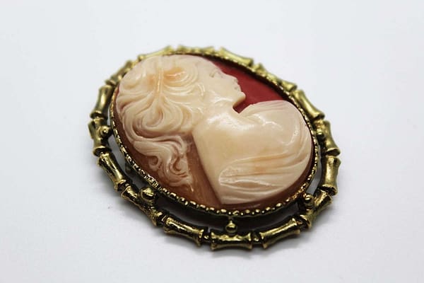 Cameo Brooch "Pony Tail Girl" in Gold Tone Frame at whisperingcityrva.com