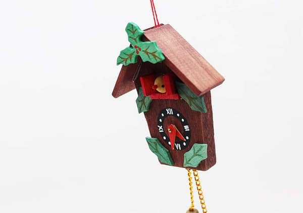 Vintage Wooden Cuckoo Clock Christmas Ornament with Holly Leaves and Yellow Bird at whisperingcityrva.com
