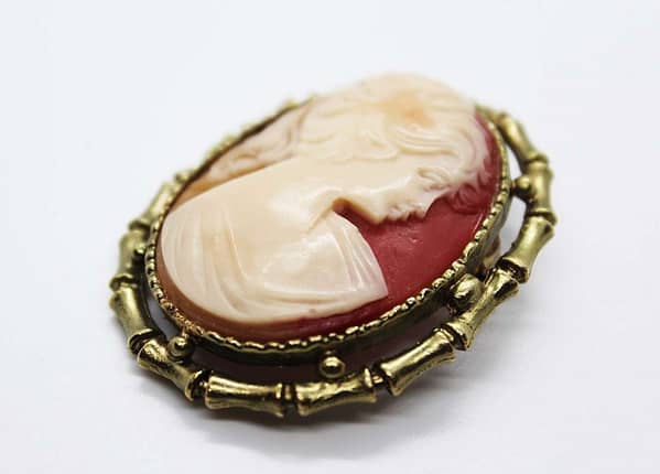 Cameo Brooch "Pony Tail Girl" in Gold Tone Frame at whisperingcityrva.com